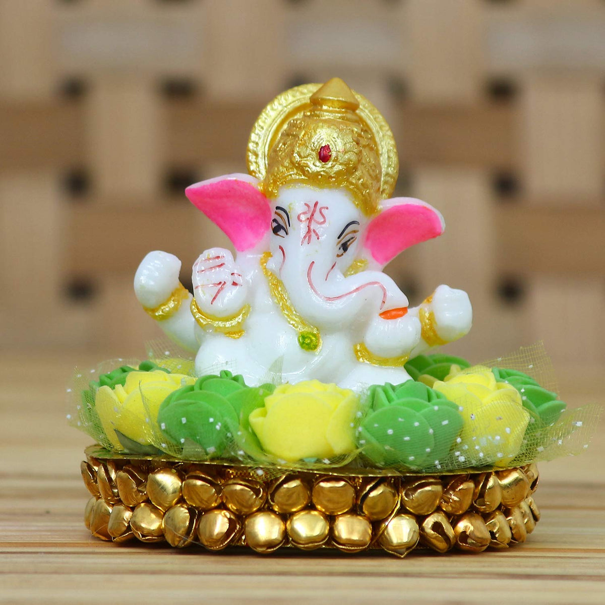 Lord Ganesha Idol on Decorative Handcrafted Plate with Green and Yellow Flowers