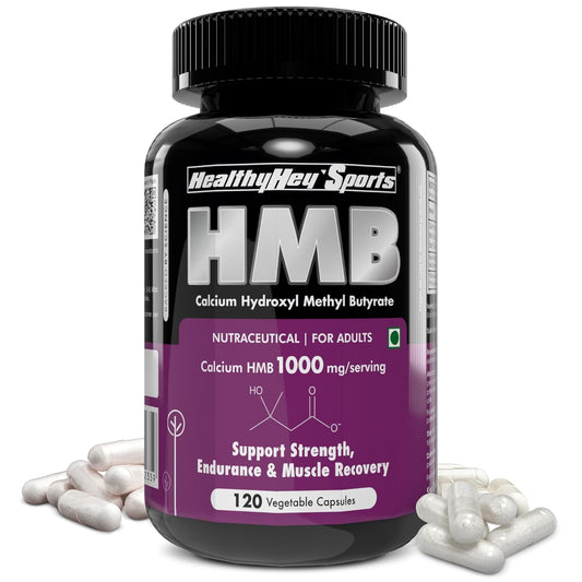 Bottle of HMB supplement with capsules on a white background