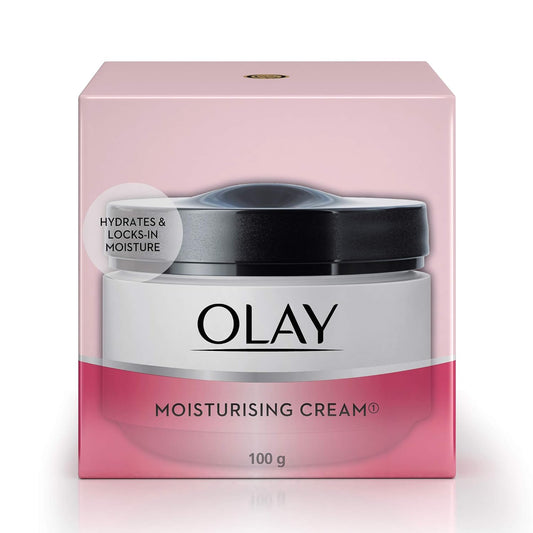 Olay moisturizing cream packaging on a pink background