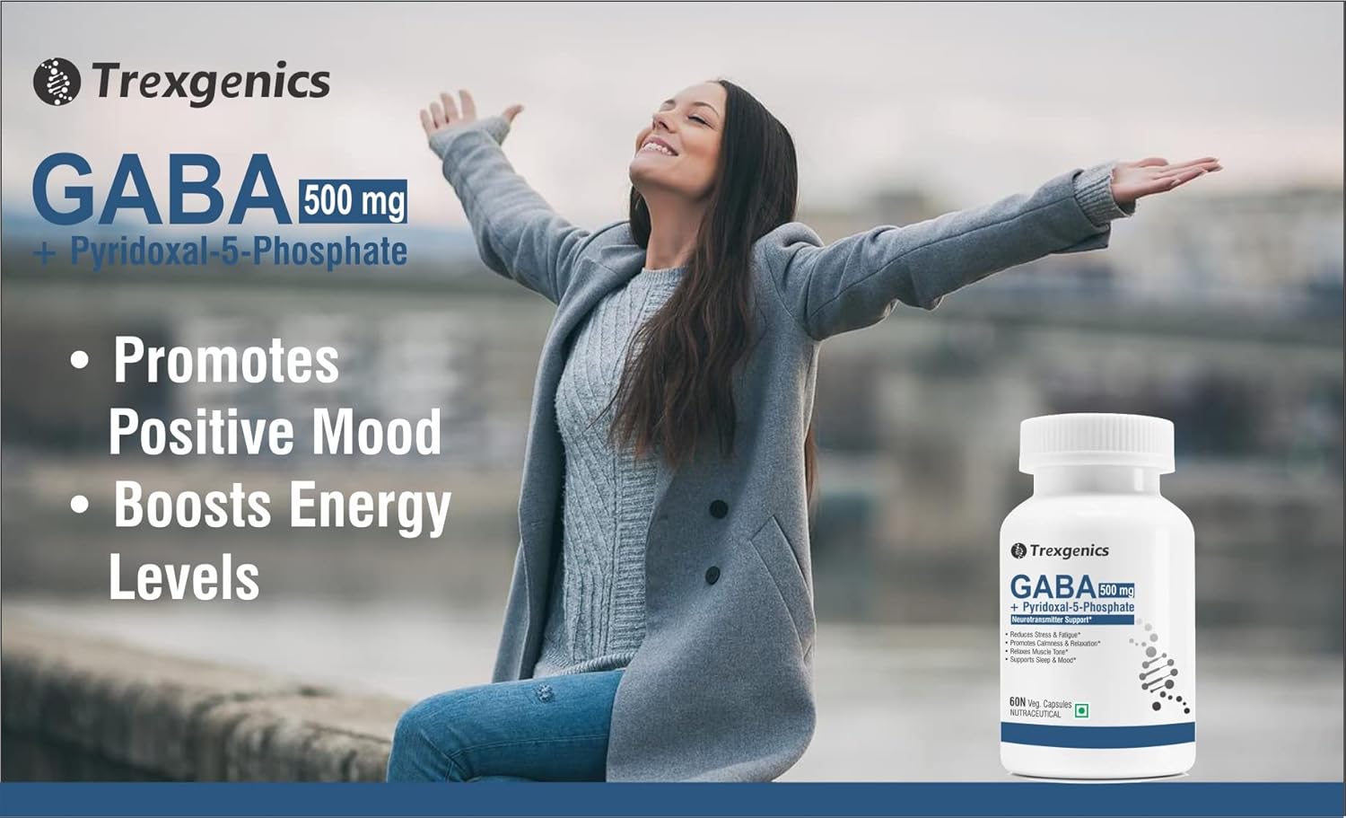 Woman with arms outstretched next to Trexgenics GABA supplement bottle by a waterfront.