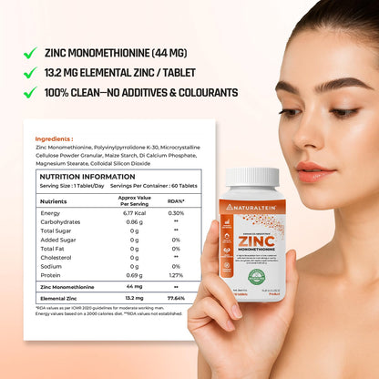 Woman holding a bottle of Naturalstein Zinc Monomethionine supplement with product details displayed.