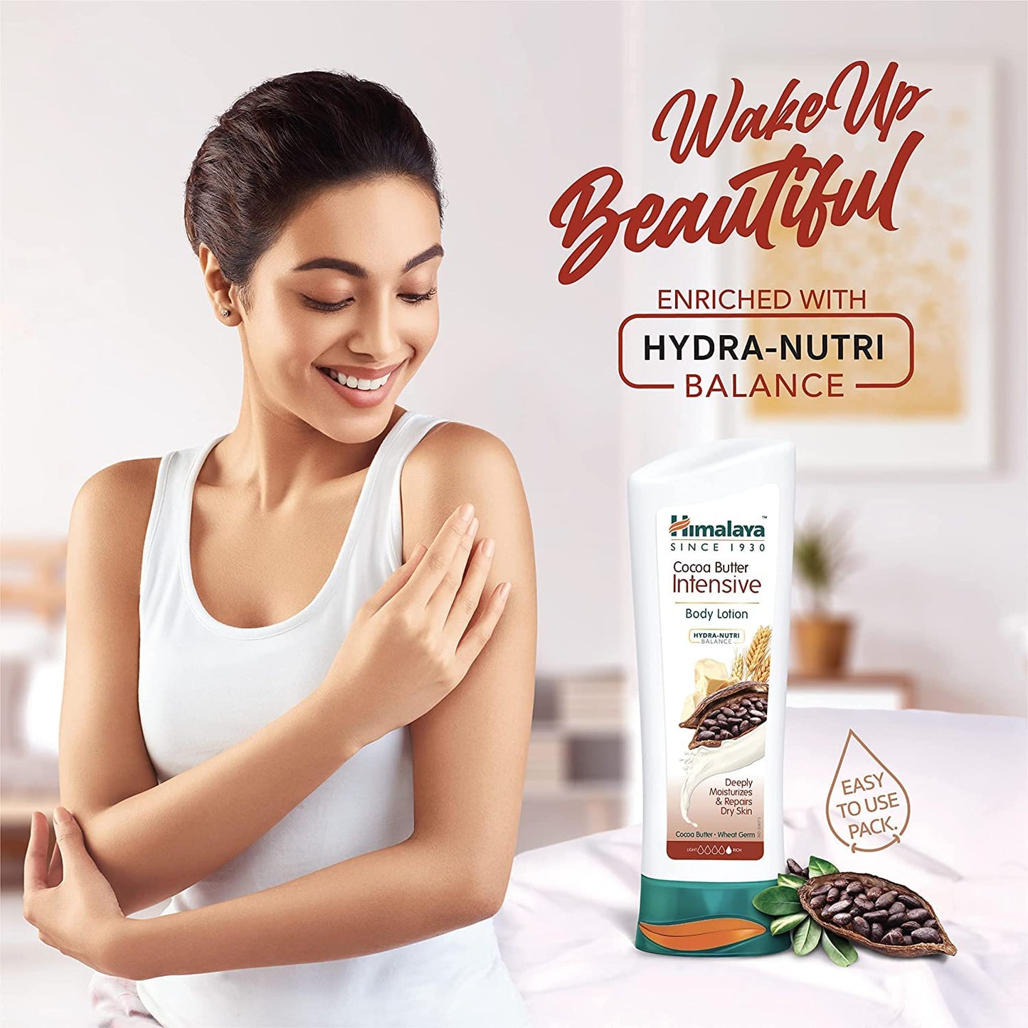 Woman applying lotion with a bottle of Himalaya Body Lotion in the foreground.