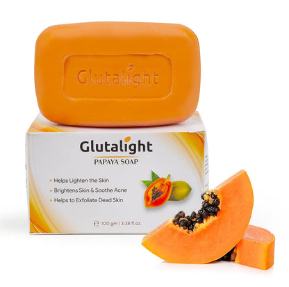 Glutalight Papaya Soap with packaging and a slice of papaya on a white background
