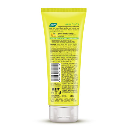 Yellow tube of JOY skin fruits brightening lemon face wash on a white background