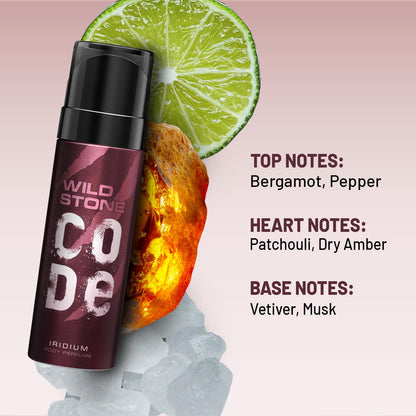 Wild Stone Code perfume bottle with a lime and orange slice on a pink background