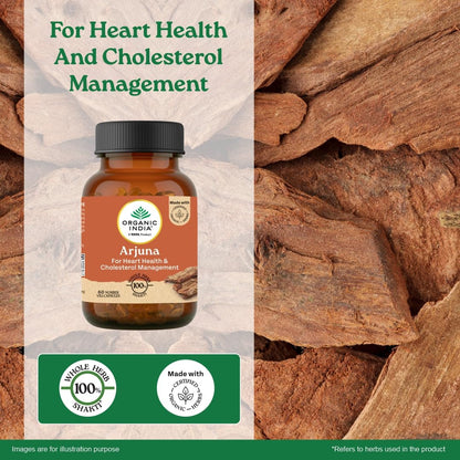 Bottle of Organic India Arjuna supplement with wooden background