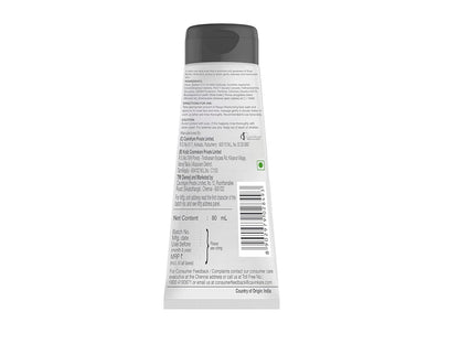 Back view of a skincare product tube with text and a barcode on a white background