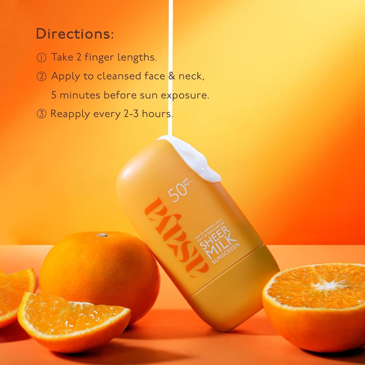 Sunscreen bottle with orange slices on an orange background