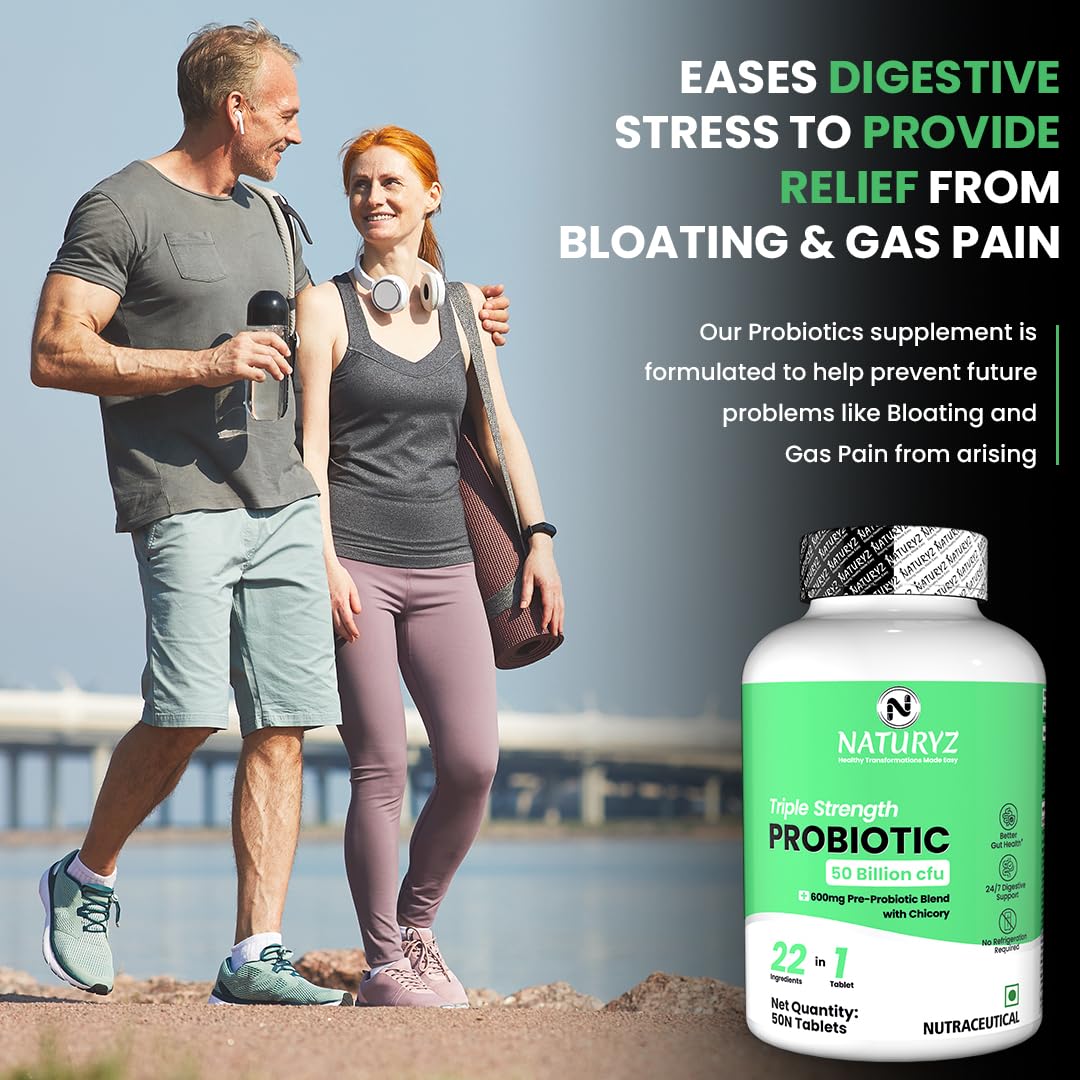 Man and woman walking outdoors with a bottle of Naturz Probiotic supplement in the foreground.