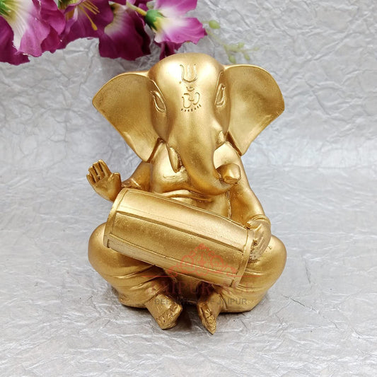 Lord Ganesh Statue Playing Dholak Figurines of Ganesh | Gold Color Polyresine Vinayak Idol 14CM | Idol for Home & Office Decor, House Warming Gift Item Size 14 X 12 cm
