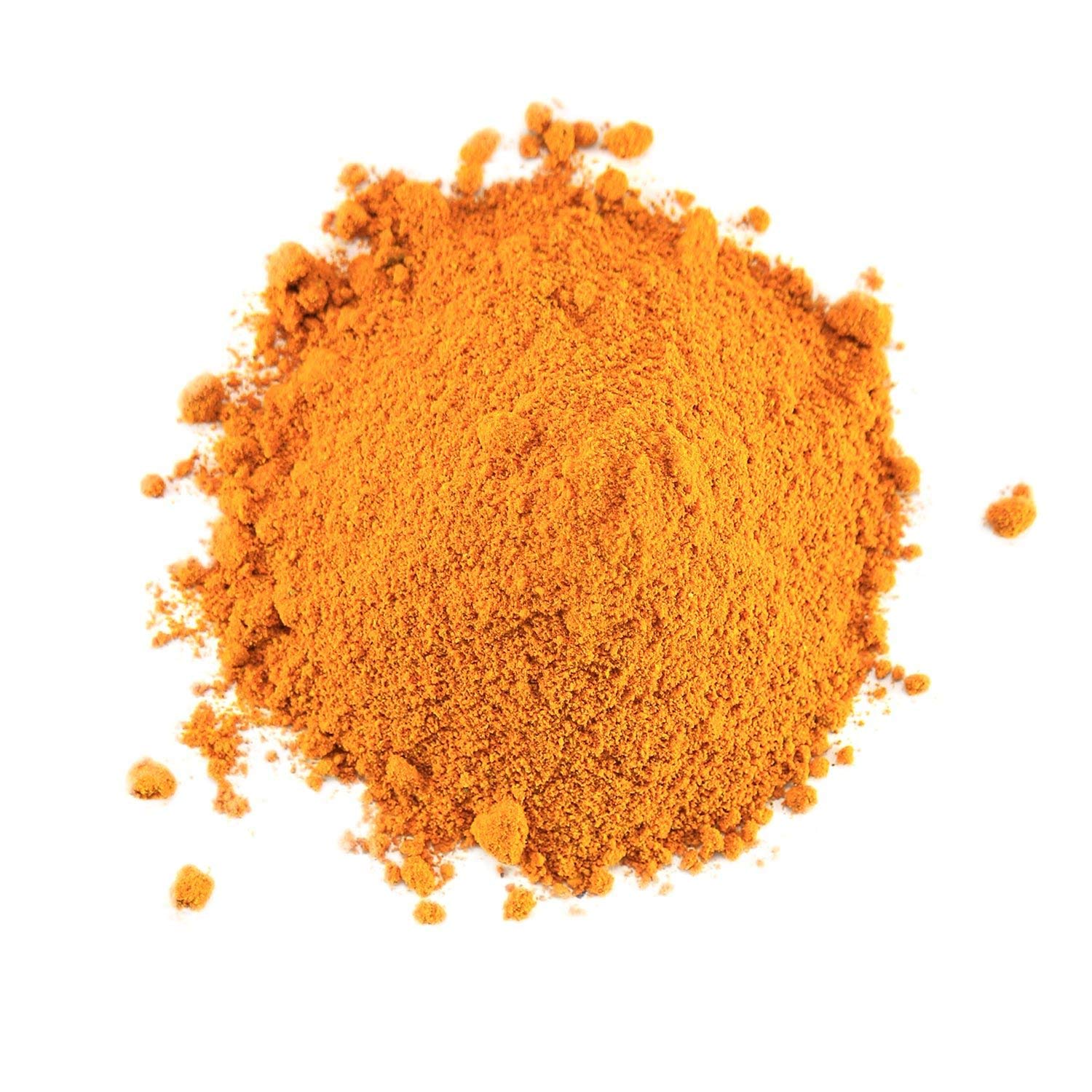 Turmeric powder on a white background