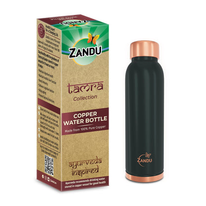 Zandu copper water bottle with packaging on a white background