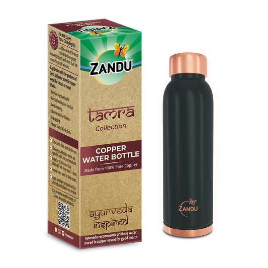 Zandu copper water bottle with packaging on a white background