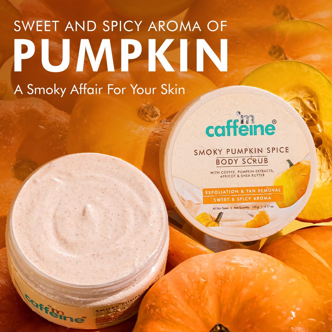 Caffeine Smoky Pumpkin Spice body scrub with pumpkins in the background