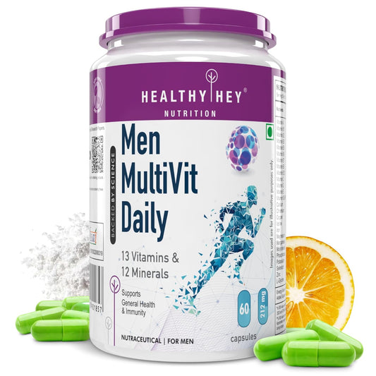 Men's multivitamin supplement container with capsules and an orange slice on a white background
