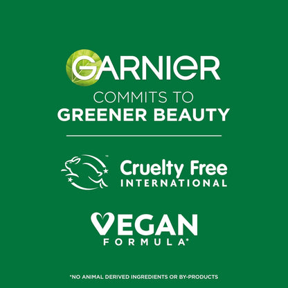 Garnier commitment to greener beauty with cruelty-free and vegan certification logos on a green background.