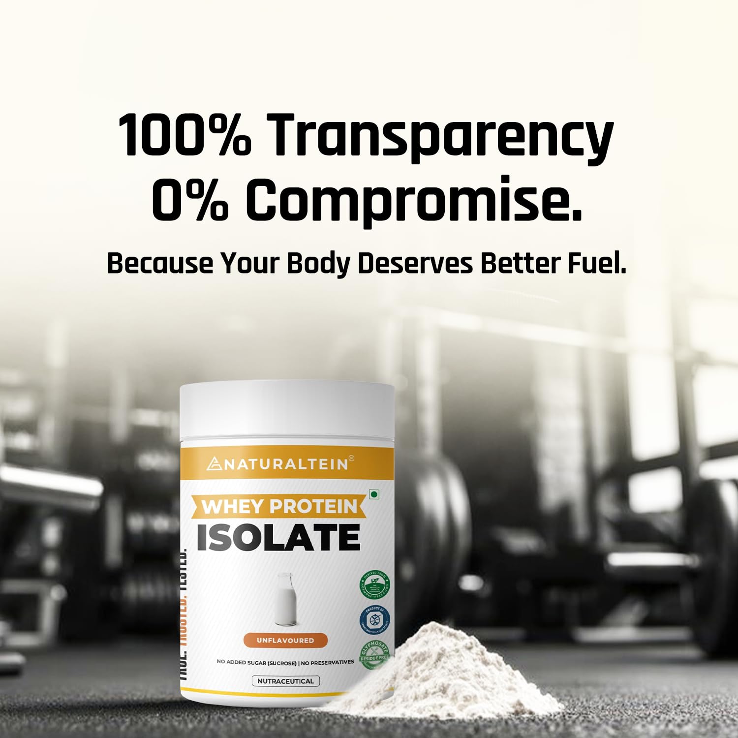 Naturaltein whey protein isolate container with protein powder on a blurred gym background