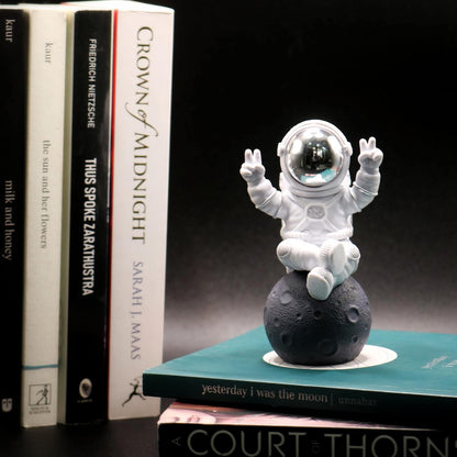 Astronaut Figurine Showpiece for Home Décor, Office Desk, Car Dashboard & Table Decoration | Space Astronaut Statue Collectible Gift for Home, Room & Workspace (Sitting on Moon Silver Large)