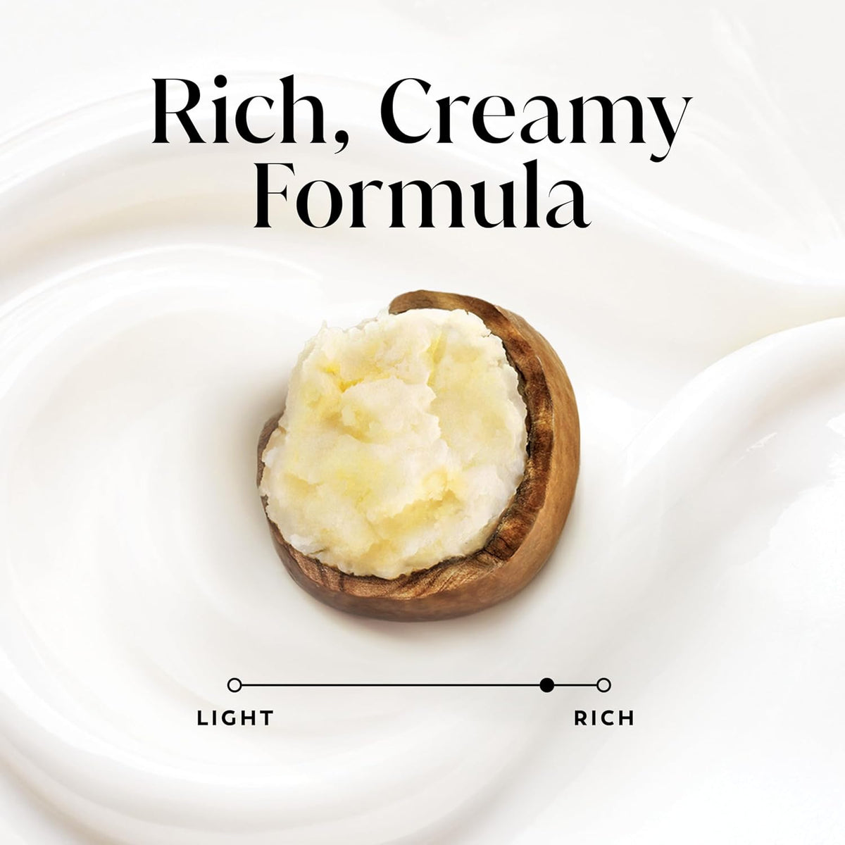 Wooden bowl with creamy substance on a white background, labeled 'Rich, Creamy Formula'.