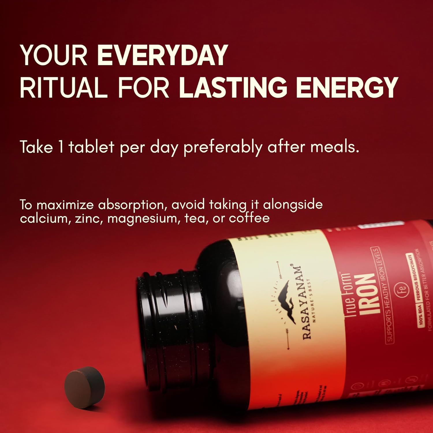 Bottle of Rasayana Iron supplement with text on a red background