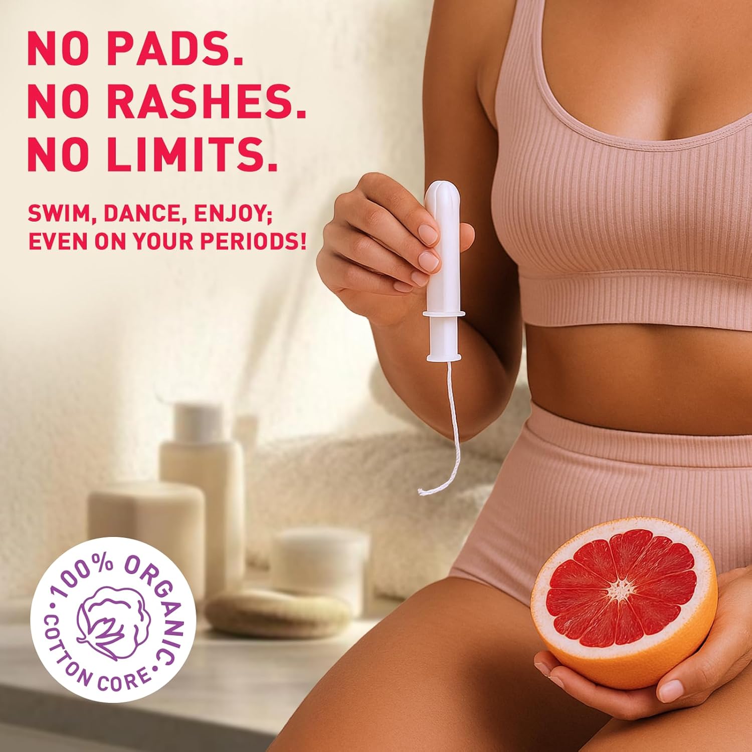 Person holding a product with text about no pads, no rashes, no limits, and organic cotton core.