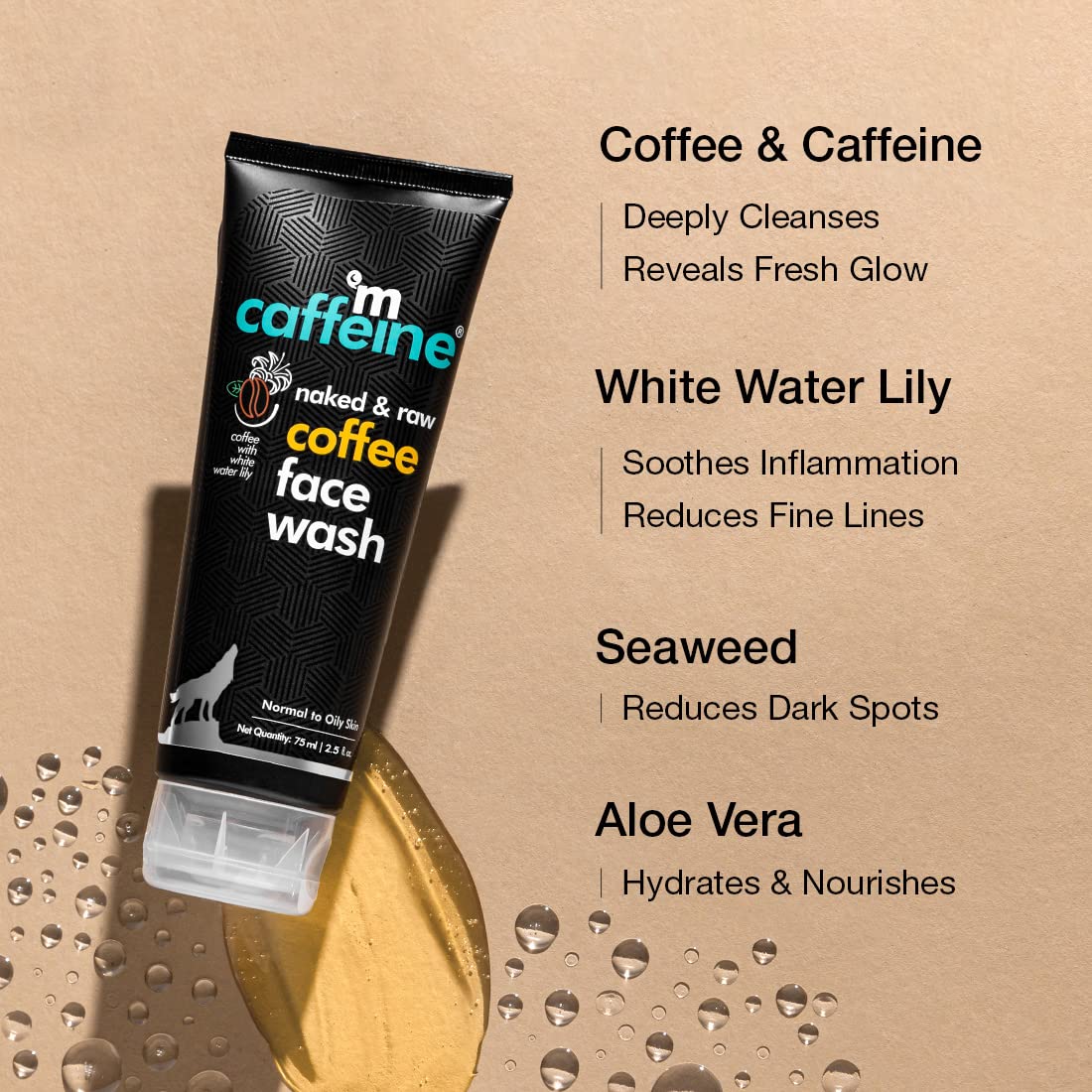 Tube of mCaffeine coffee face wash with benefits listed on a beige background