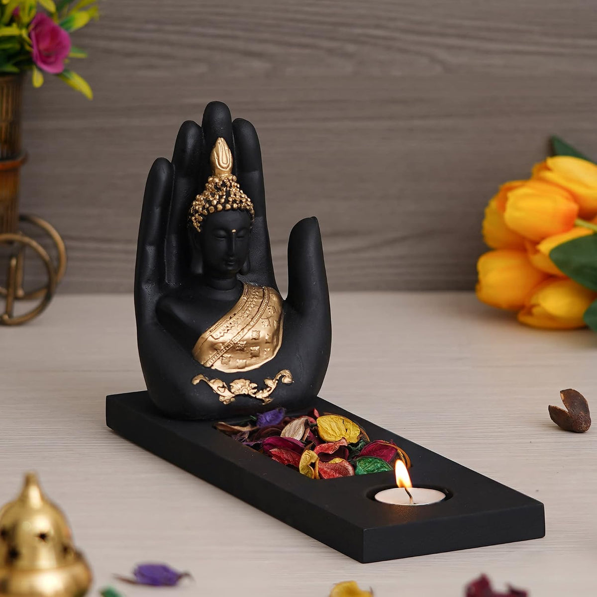 eCraftIndia Gold & Black Polyresin Palm Buddha Showpiece with Rectangle Wooden Base, Fragranced Petals & Tealight