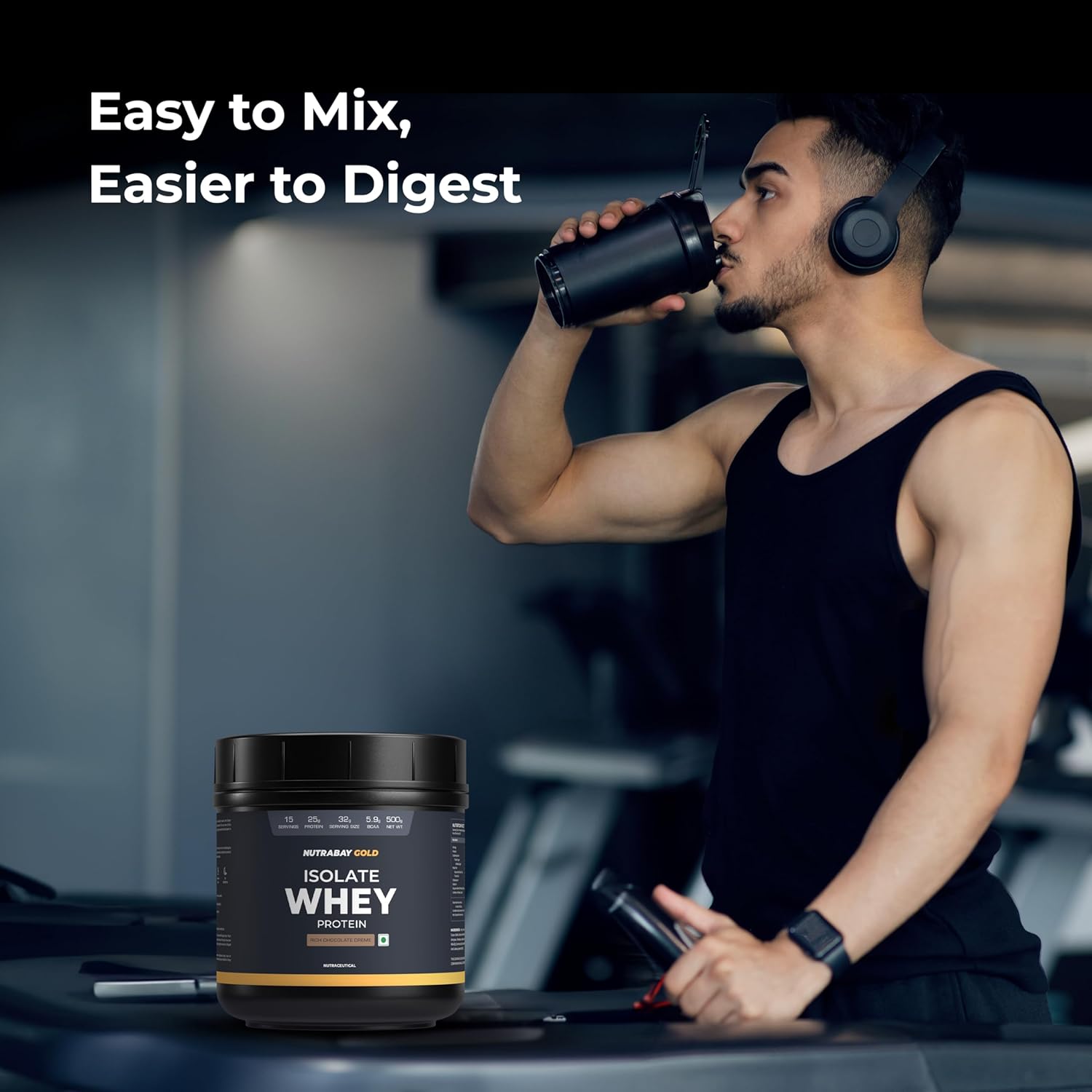 Man drinking from a protein shaker with isolate whey protein container in foreground