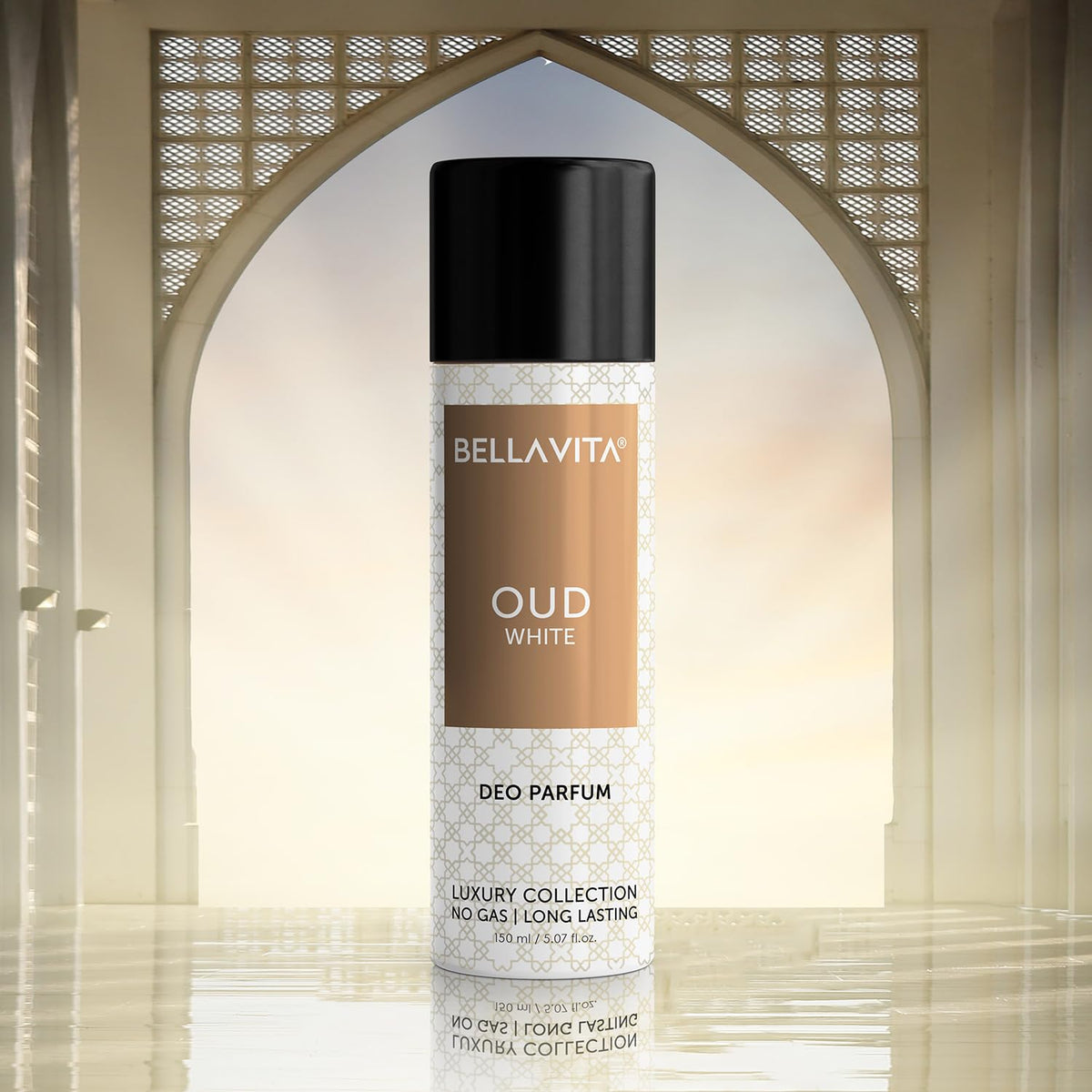 Bellavita Oud White deodorant spray bottle against a decorative arch background