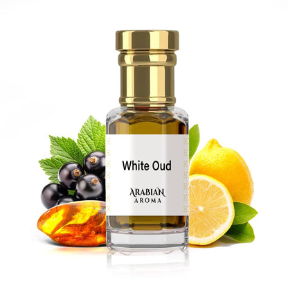 Bottle of Arabian Aroma White Oud with gold cap, surrounded by lemons, berries, and amber on a white background