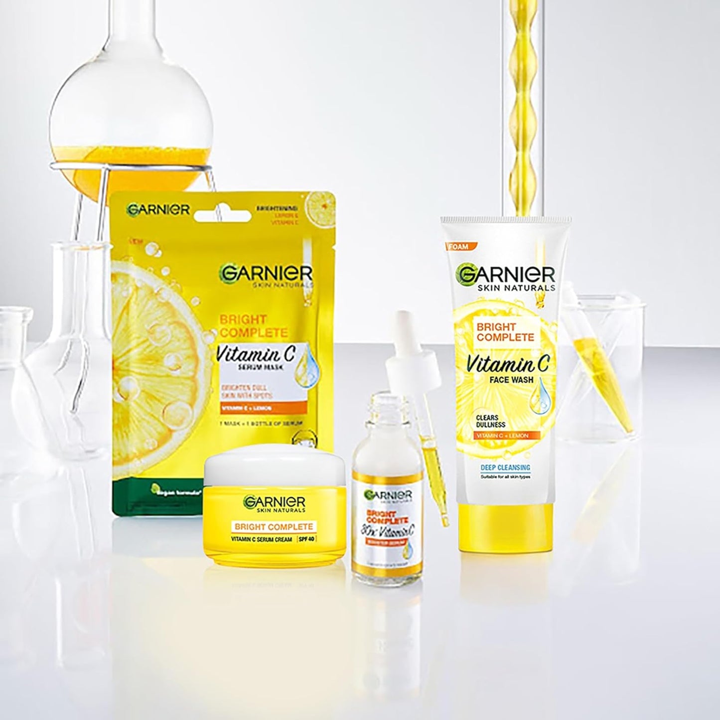 Garnier skincare products with vitamin C emphasis on a white background