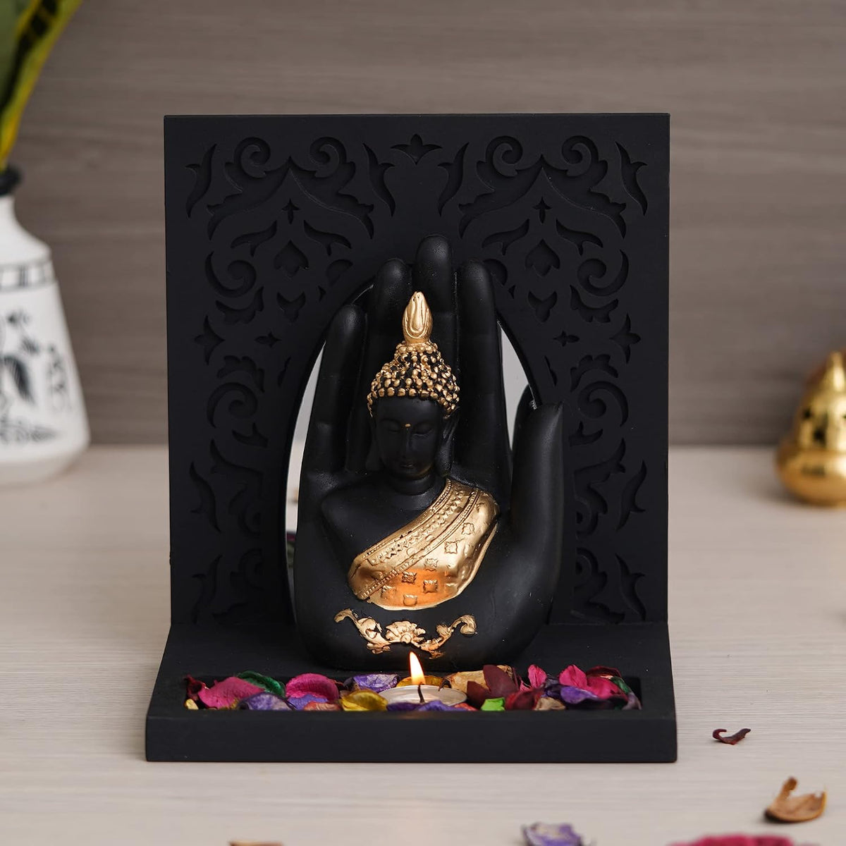 eCraftIndia Gold & Black Polyresin Palm Buddha Showpiece with Rectangle Wooden Base and Background, Fragranced Petals & Tealight
