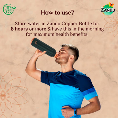 Person drinking from a Zandu copper bottle with text on how to use it.