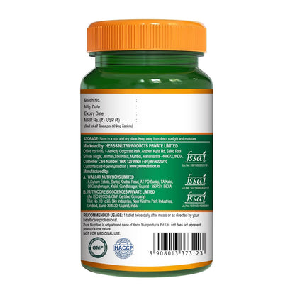 Green supplement bottle with orange cap on a white background