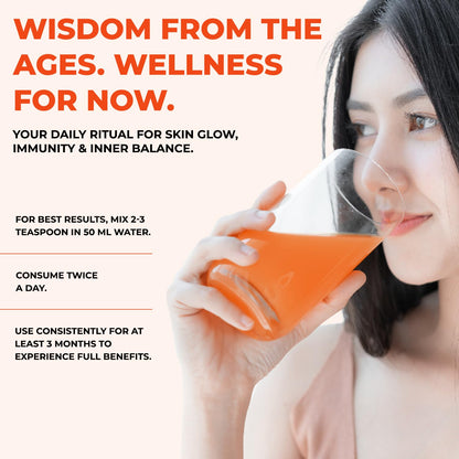 Woman holding an orange container with wellness product and text about daily ritual for skin, immunity, and inner balance.