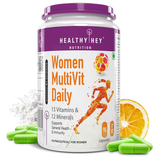 Healthy Hey Nutrition Women MultiVit Daily supplement container with capsules and a lemon on a white background