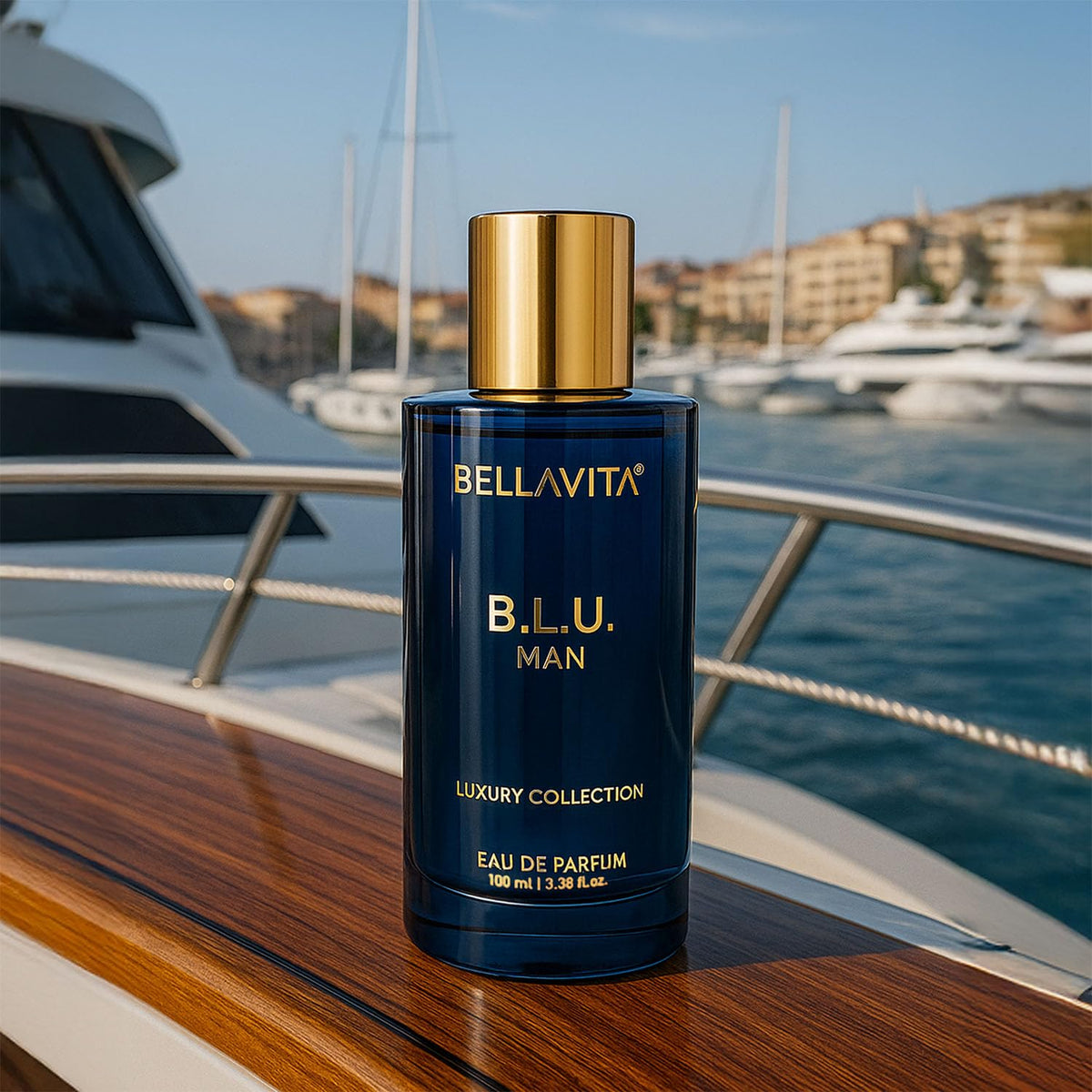 Bottle of Bellavita B.L.U. Man luxury collection eau de parfum on a boat deck with water and yachts in the background.