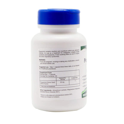 Supplement bottle with blue cap and white label on a white background