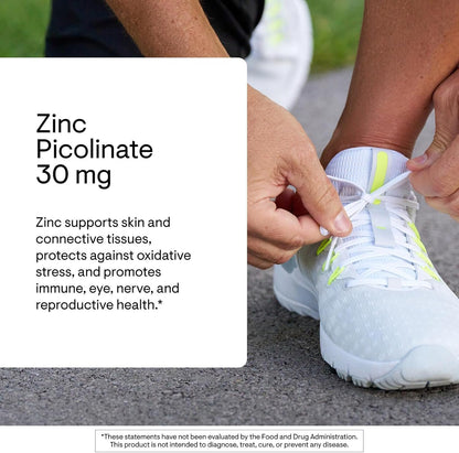 Person tying a white athletic shoe with text about zinc picolinate supplement on a white background