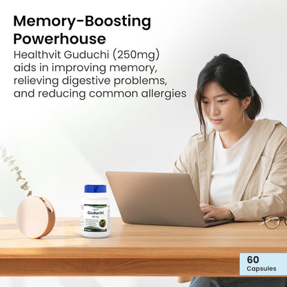 Woman working on a laptop with Healthvit Guduchi supplement on a table