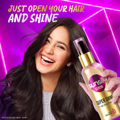 Woman holding Sunsilk Super Shine serum with promotional text on a vibrant purple background