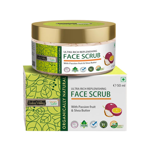 Jar of face scrub with packaging on a white background