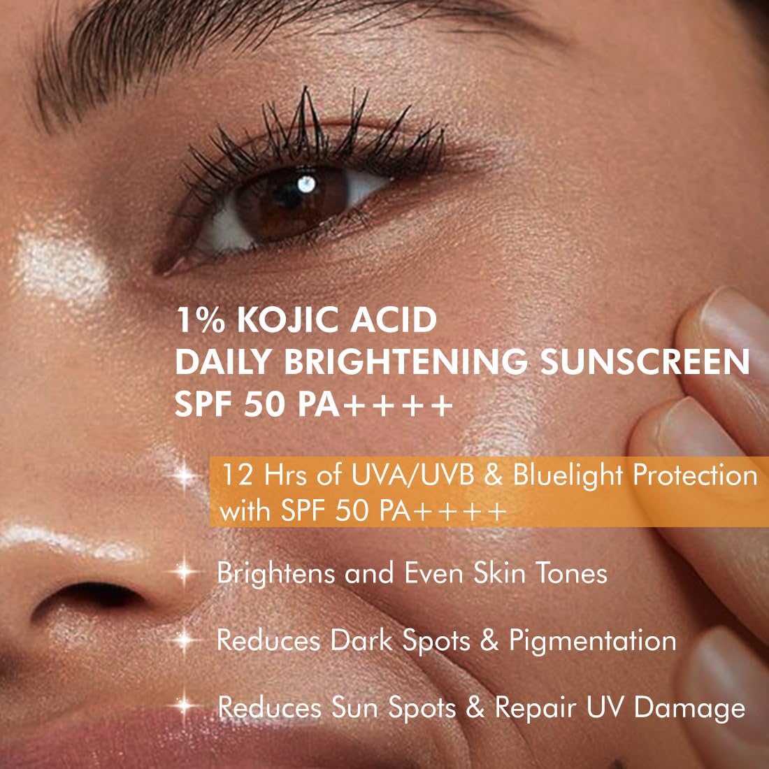 Close-up of a person's eye with text about 1% Kojic Acid Daily Brightening Sunscreen SPF 50 PA++++