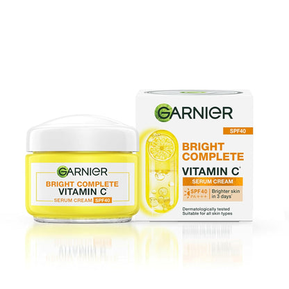 Garnier Bright Complete Vitamin C serum cream jar and packaging on a white background