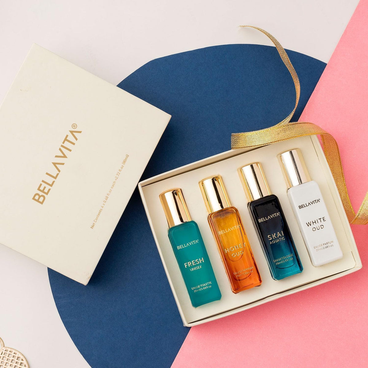 Set of Bellavita perfume bottles in a box on a colorful background