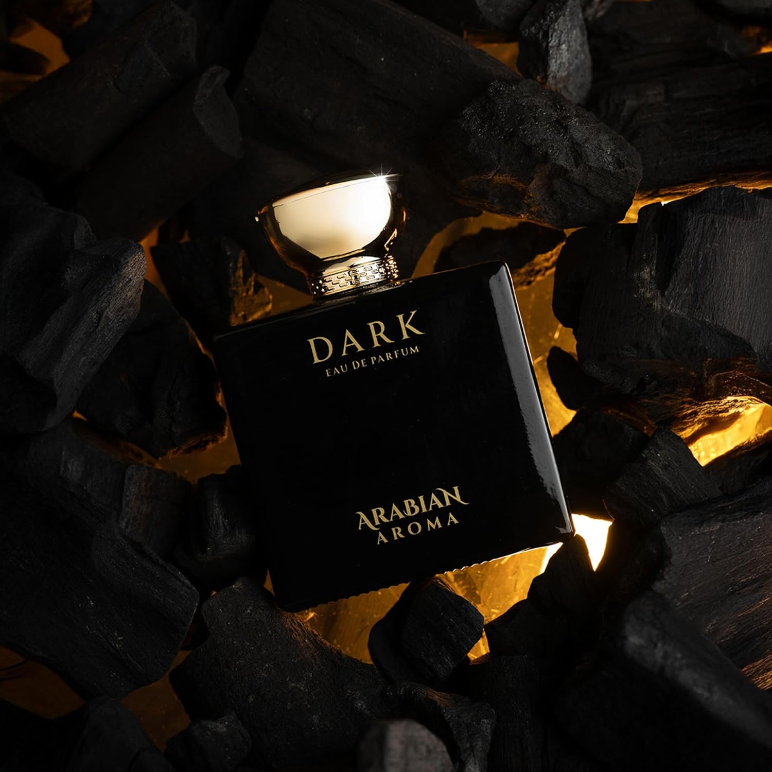 Perfume bottle labeled 'Dark Arabian Aroma' on a dark background