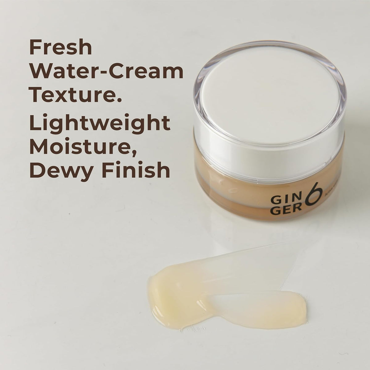 Cosmetic jar with cream texture and text describing features on a light background