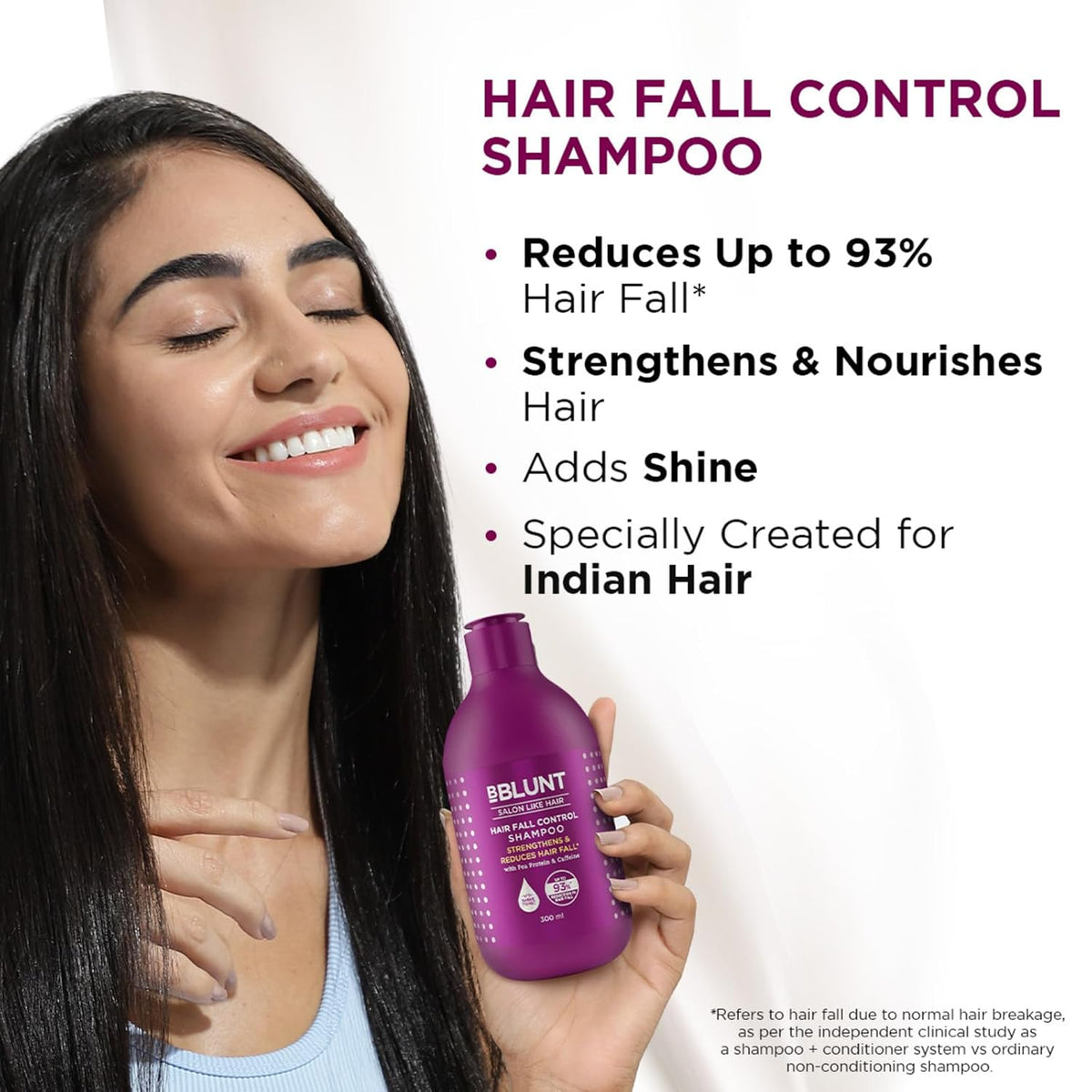 Woman holding a purple shampoo bottle with text about hair fall control shampoo.