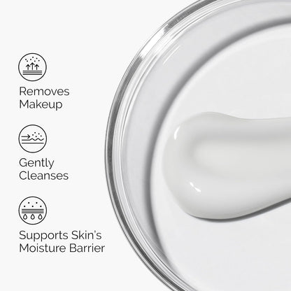 Glass container with white cream and text describing product benefits on a white background