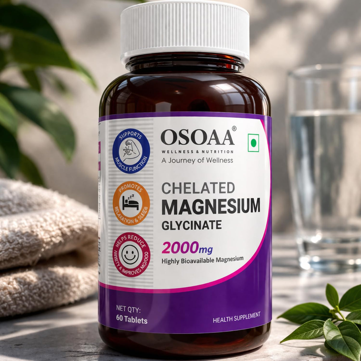 OSOAA Chelated Magnesium Glycinate supplement bottle with a glass of water and towel in the background.